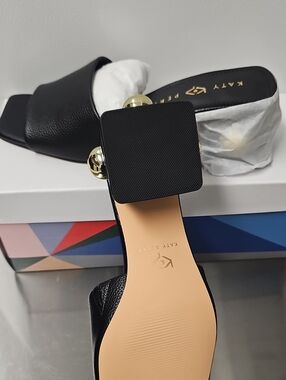 Katy Perry Collections Black Slide Mules with Gold Orb Detail